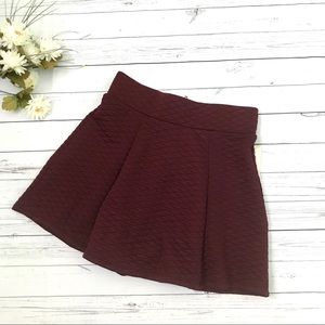 Burgundy mini skirt